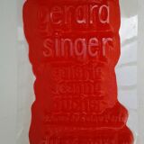 Thermoformed poster in red Color Gérard Singer
