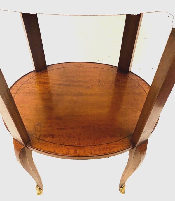 Gueridon ovale en bois de placage et filet de bois noir XX siècle