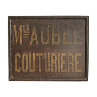 Cast-glass plate "Seamstress" early twentieth