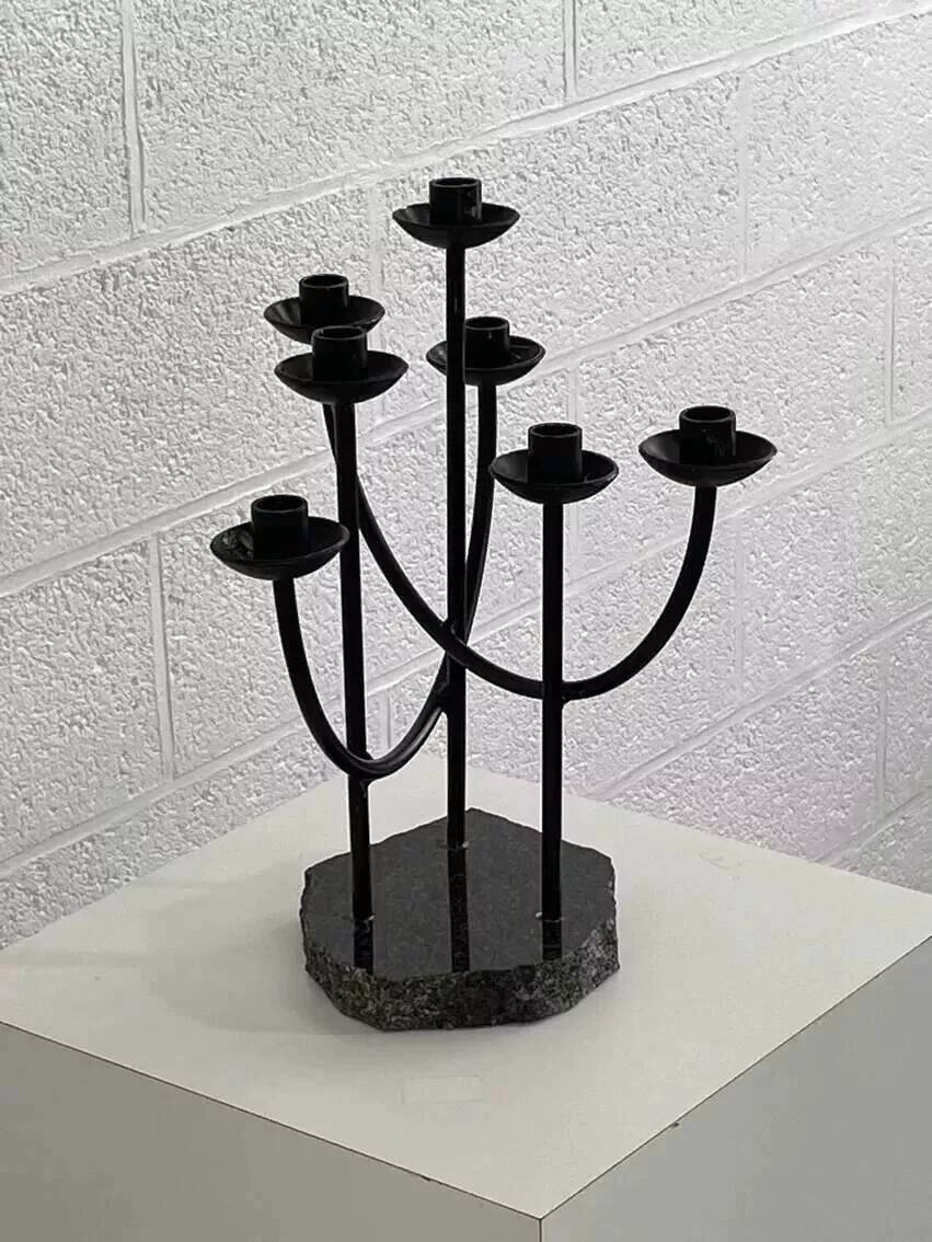 Metal candle holder and black quartz base