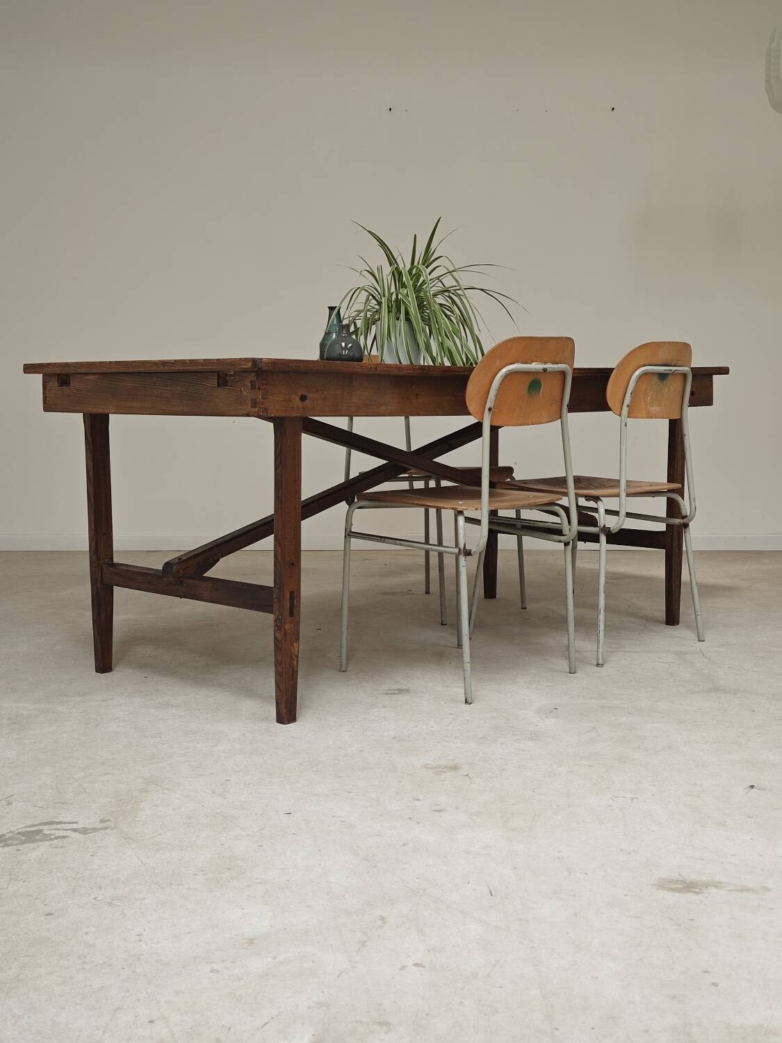 Vintage workshop folding table in oak with a hand-patinated black top.