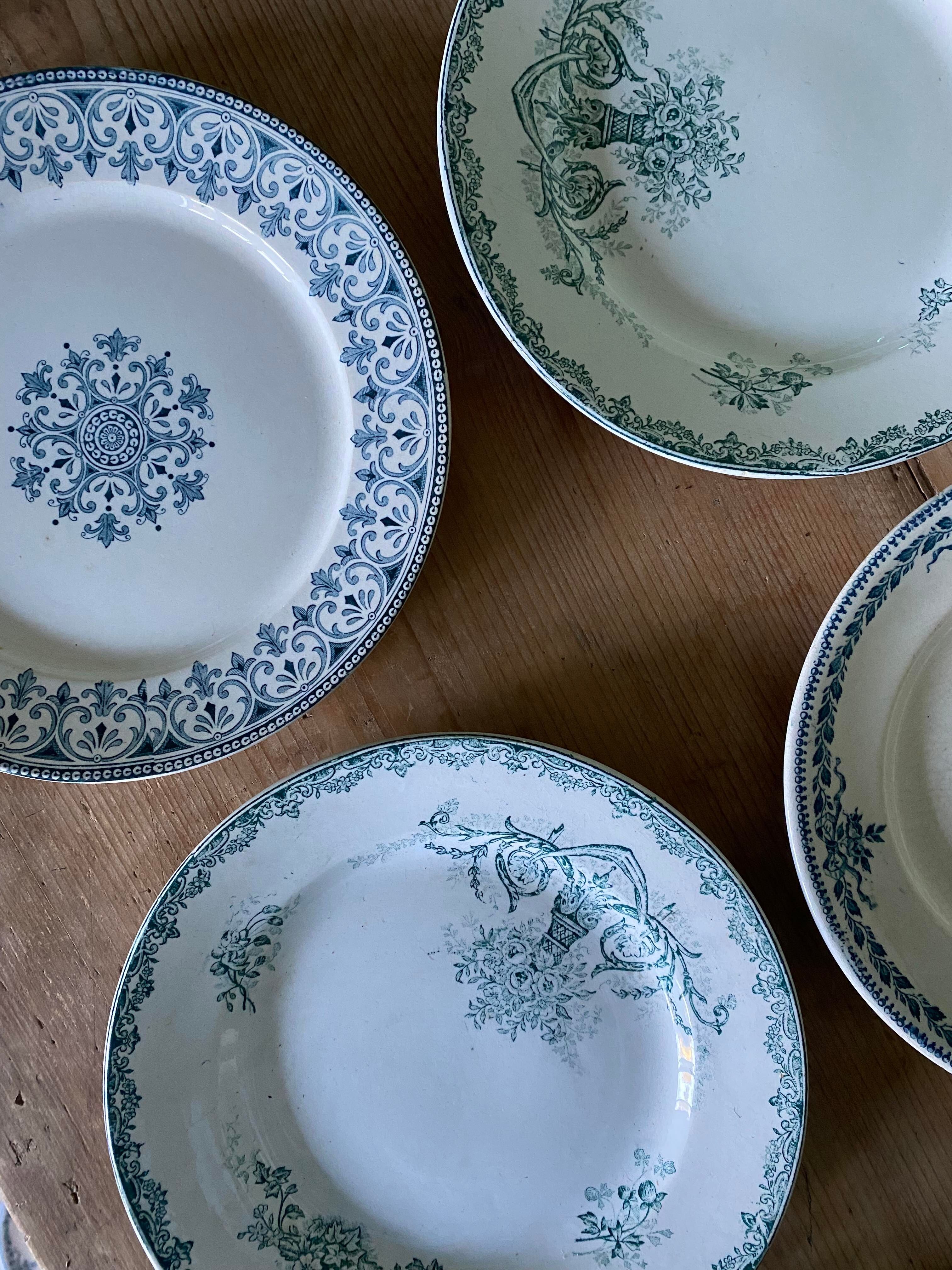 Set of 6 old flat plates in mismatched iron earth