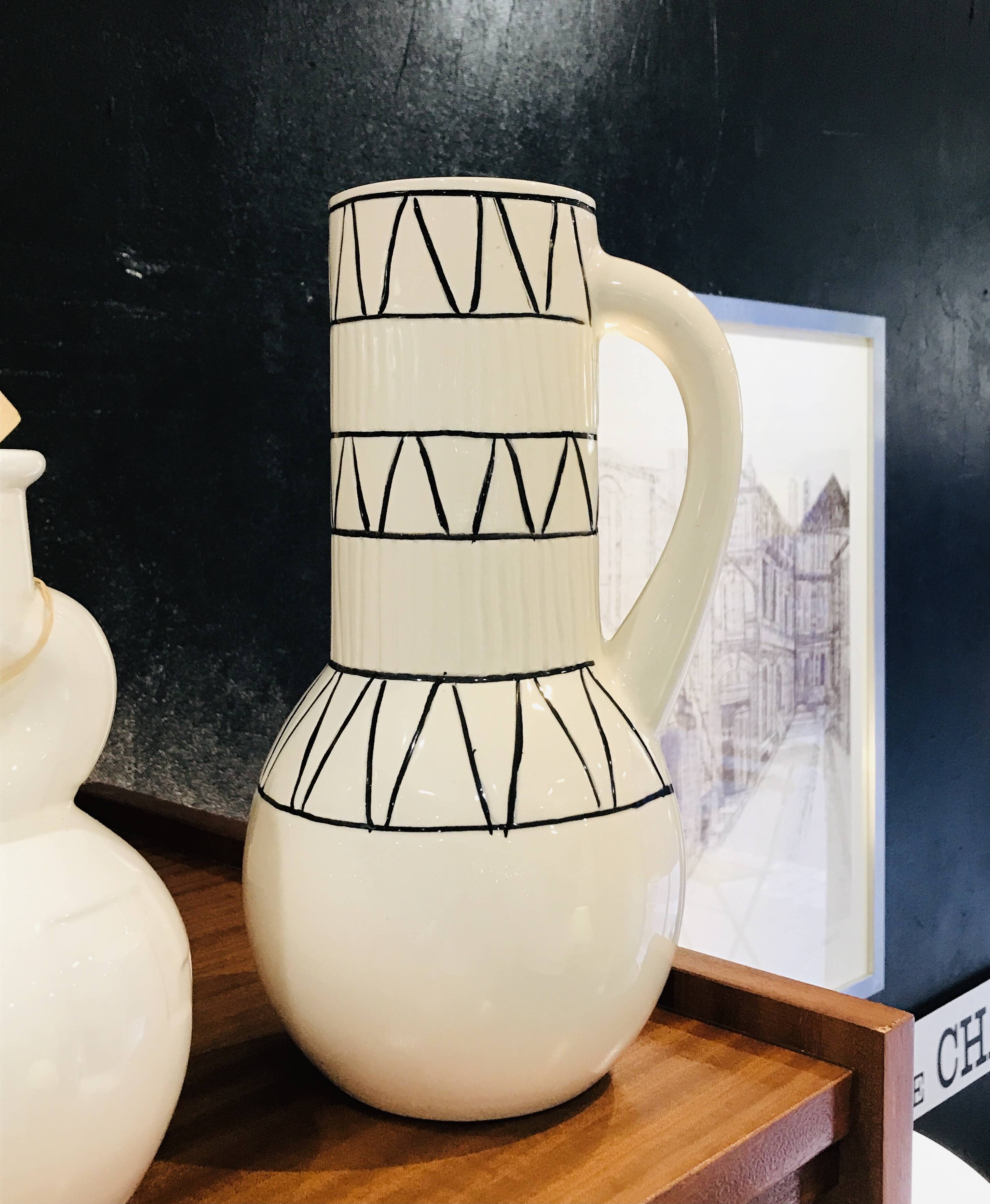 Vase with geometric pattern handles