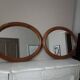 Paire de miroirs anciens ovales