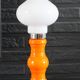 Table lamp or bedside lamp from the 1960s-70s in orange and chrome.