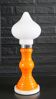 Table lamp or bedside lamp from the 1960s-70s in orange and chrome.