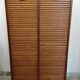 Double curtain cabinet