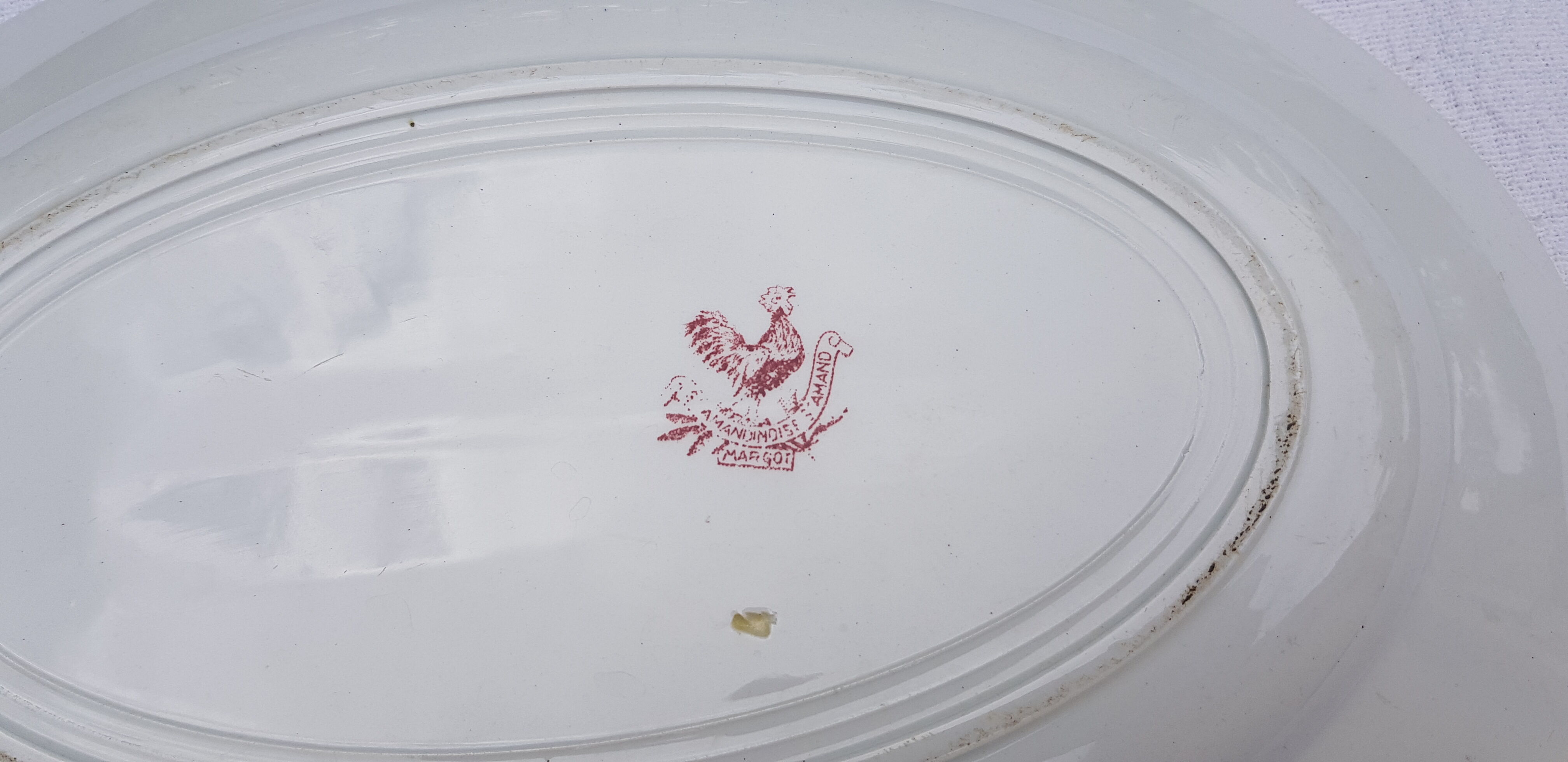Oval serving dish in earthenware of Sté Amandinoise model Margot, iron earth.