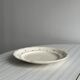 Vintage blue polka dot plate with scalloped edge