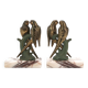 Art Deco pair of bookends with metal parrots and a marble base.
