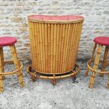 Bamboo tiki bar and two stools