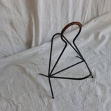 Leather-covered metal magazine holder