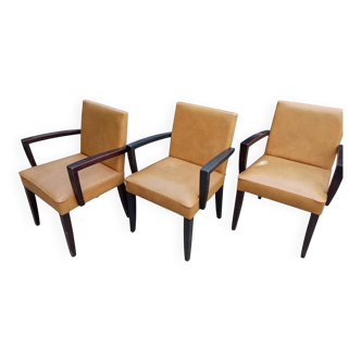 Beige leatherette bridge armchairs