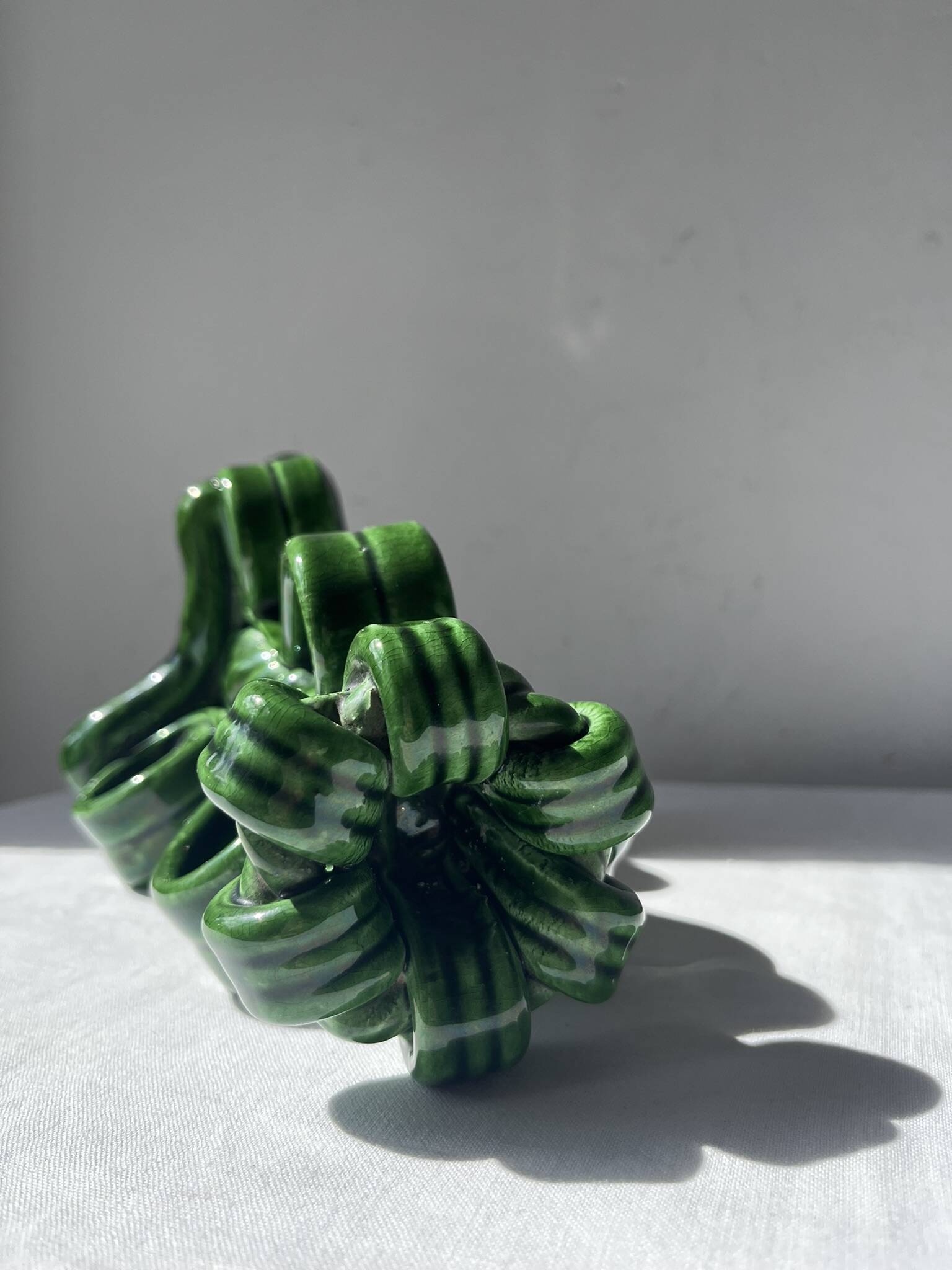 Lot of woven ceramic candle holders in green Vallauris.