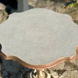 Carved and lacquered wooden side table.