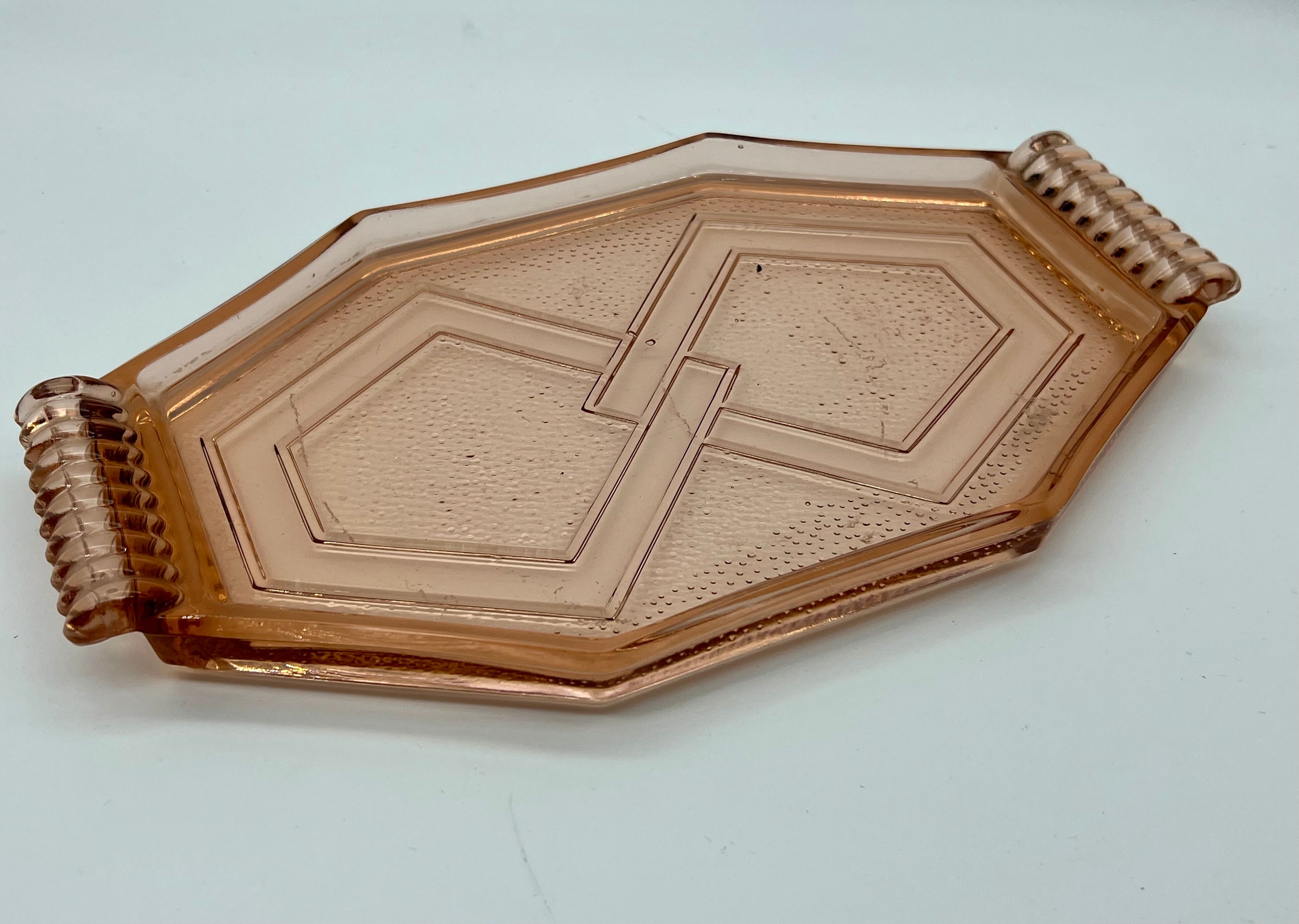 Art deco tray in pink glass with handle