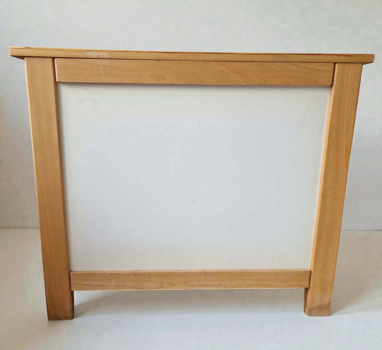 Commode style with rounded edges.