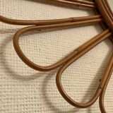 Old vintage asymmetrical round rattan mirror
