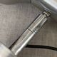 Pair of brushed metal wall sconces