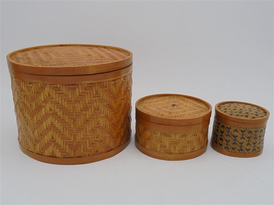 Trio of rattan boxes