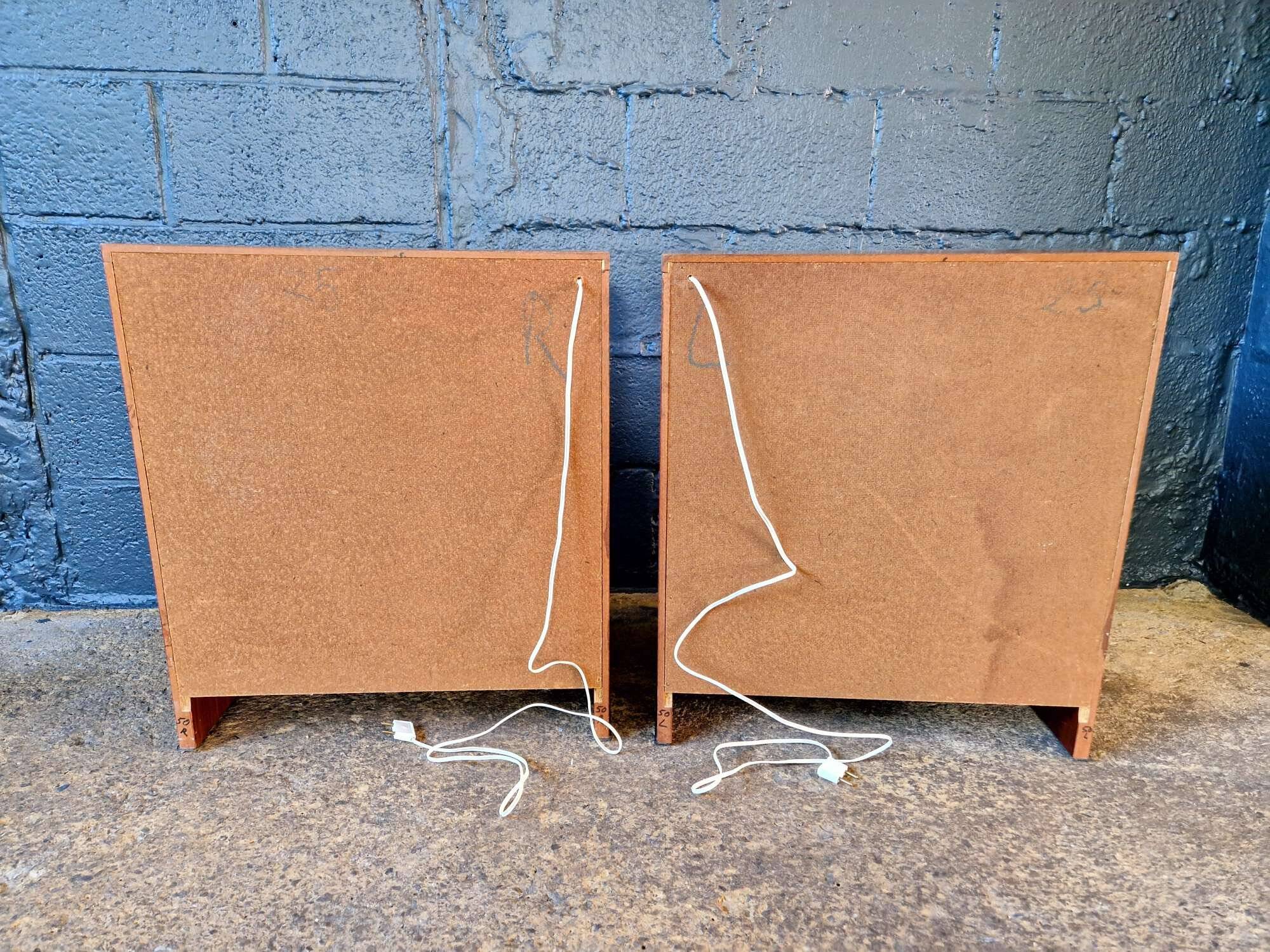 Pair of rosewood bedside tables, 1960s-70s