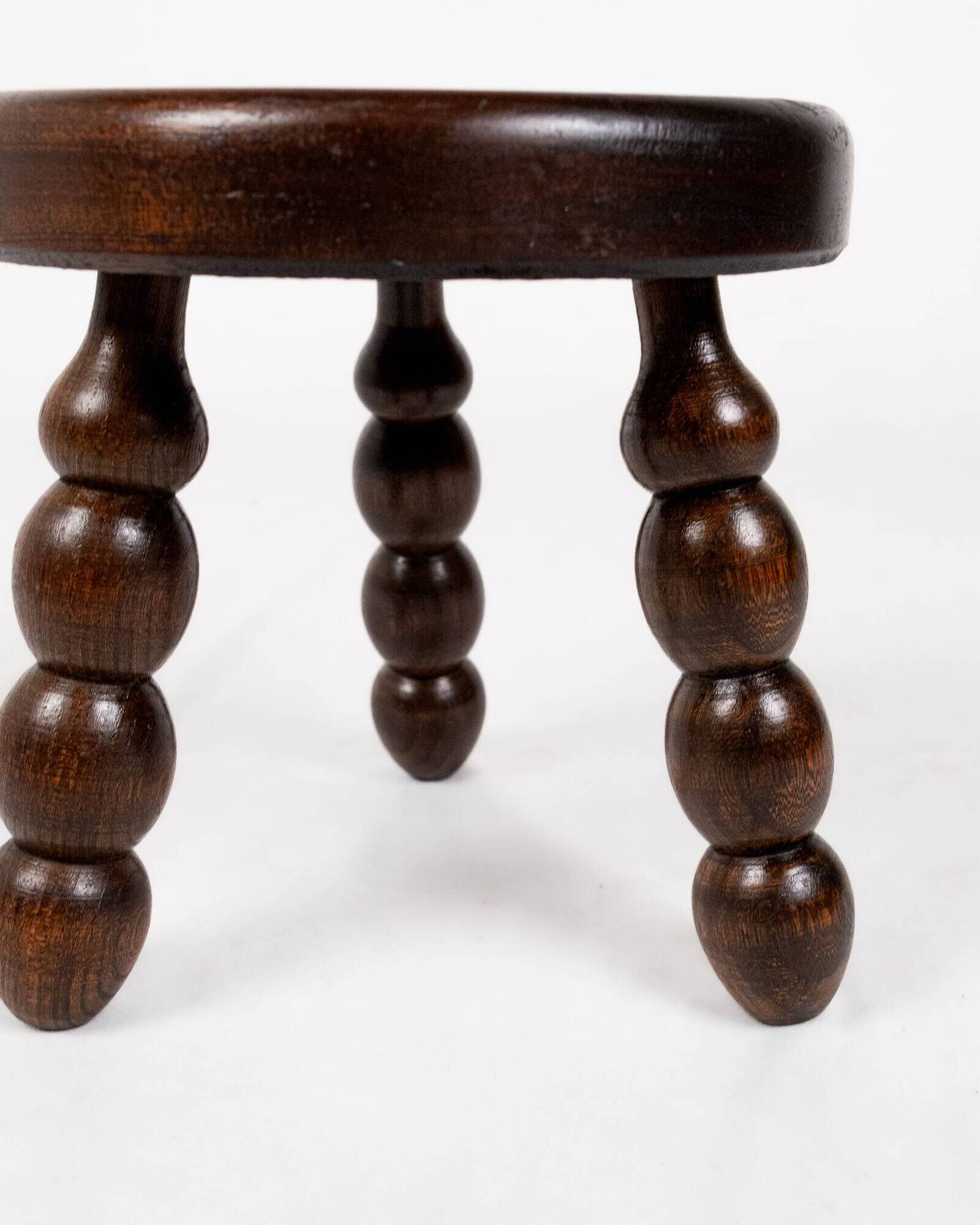 Low chair and turned wooden stool, Dudouyt style, France, 1940s