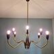 Spider chandelier in brass and black lacquered metal Italian design 1950s