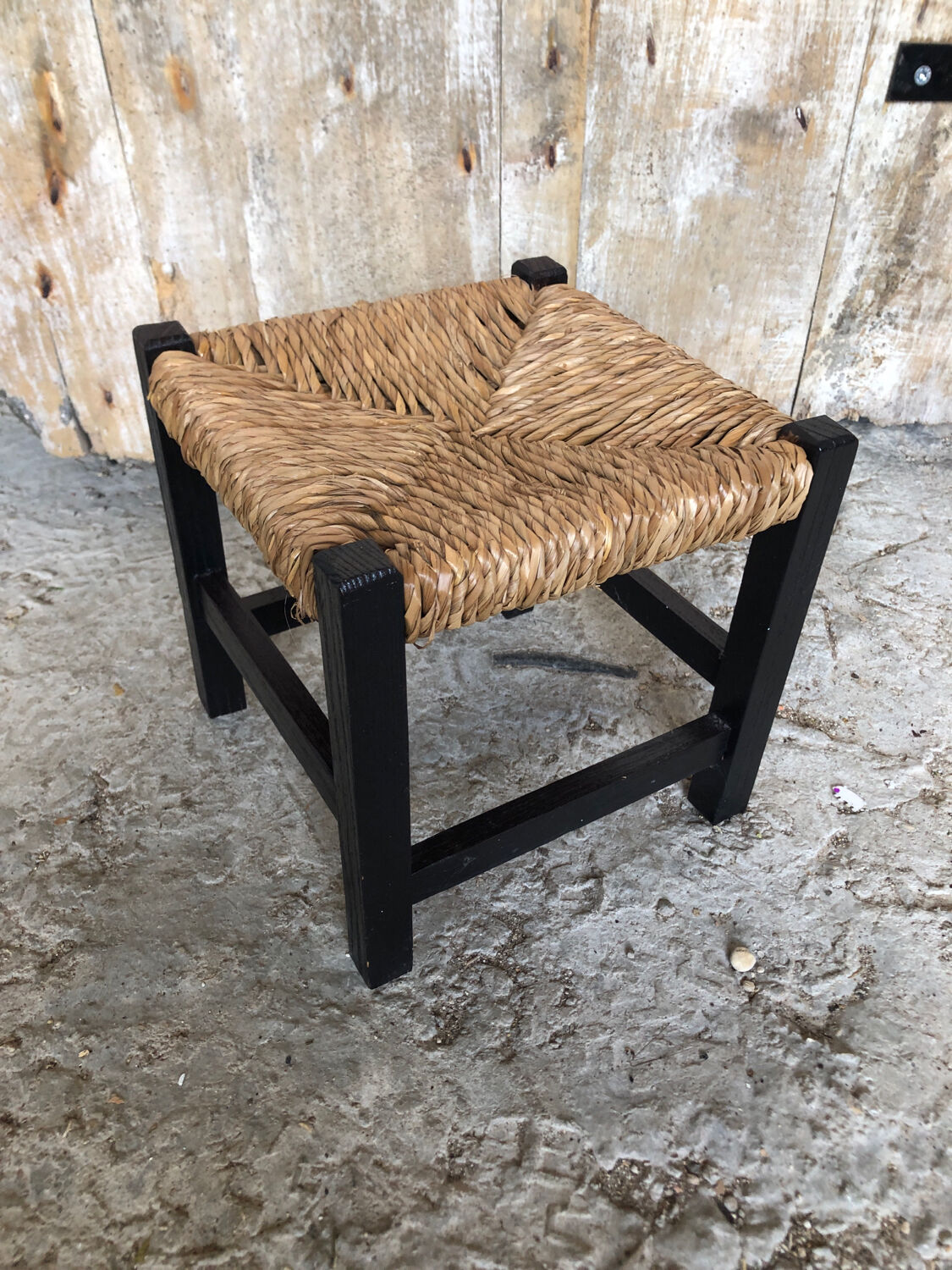 Black wood foot rest stool & vintage mulched seat