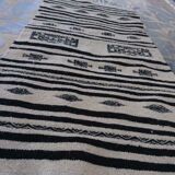 Beige and black handmade carpet, 110x55cm