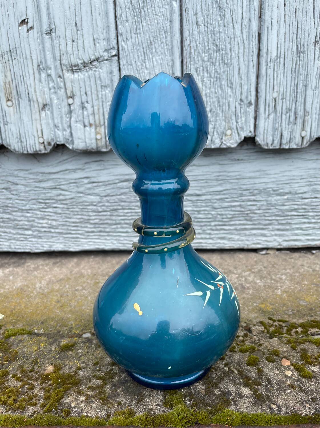 vintage vase painted in satin blue