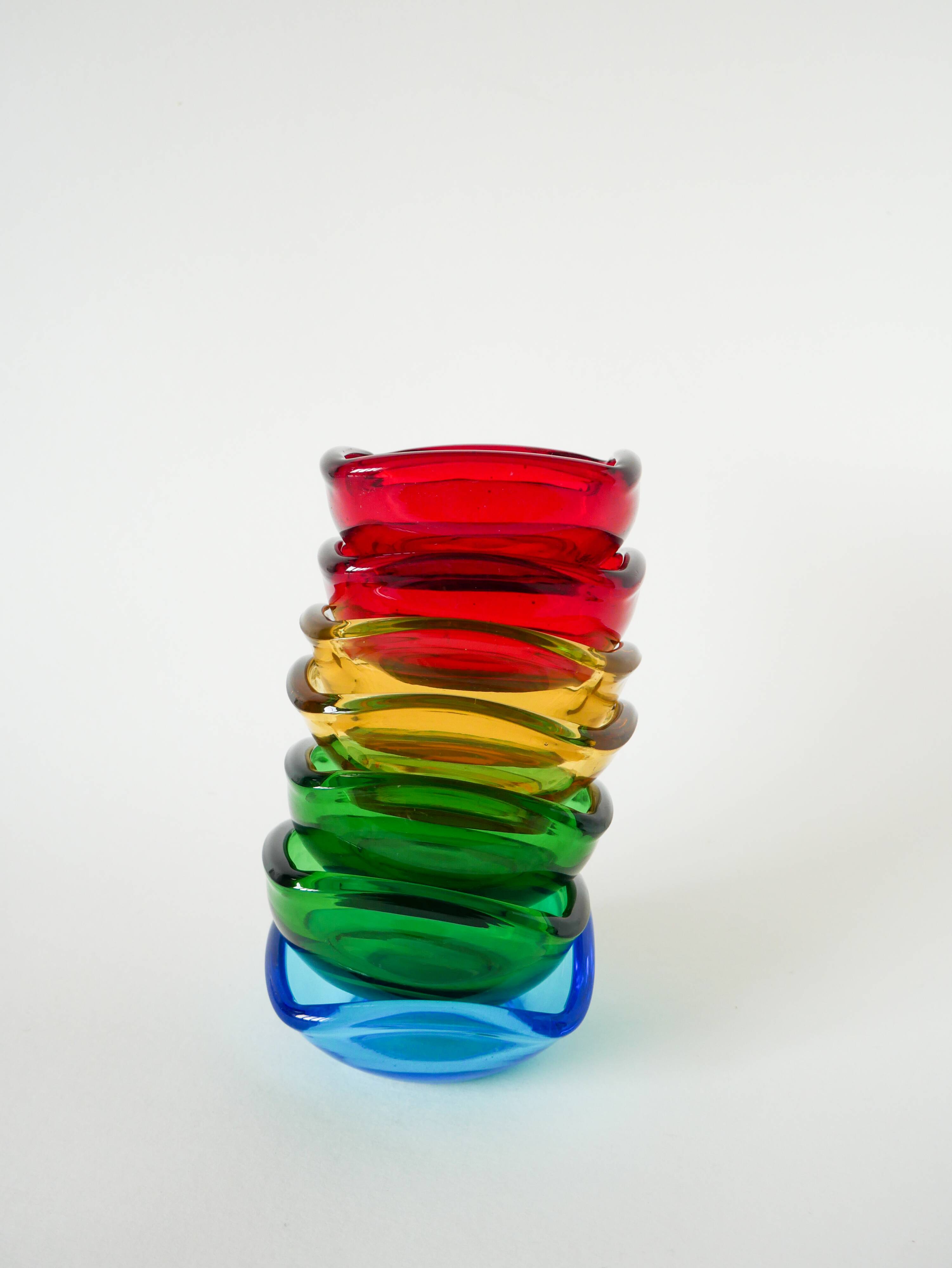 Pair of green colored glass storage compartments, in the Murano style, 1970