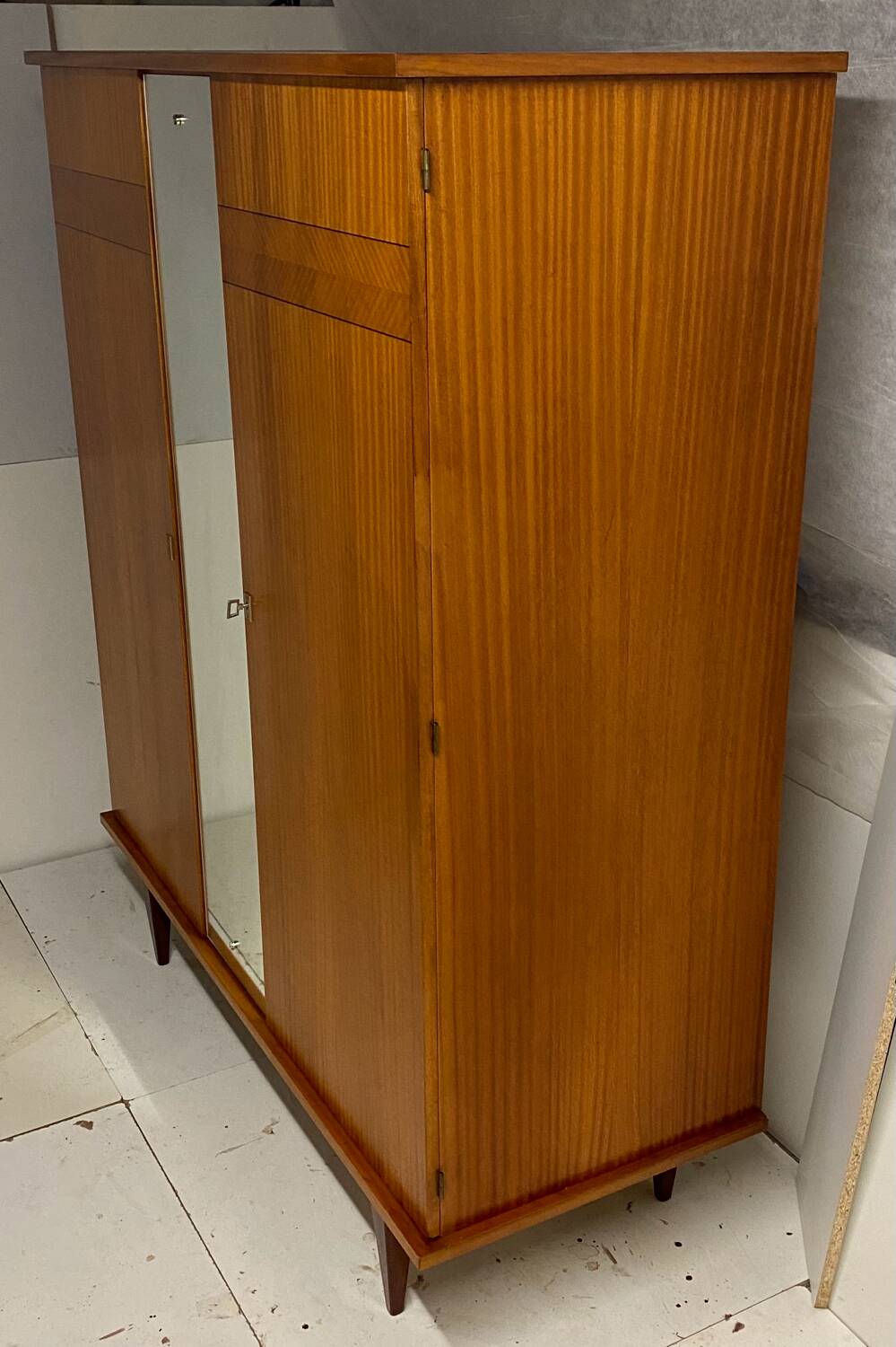 Vintage wardrobe with compass feet from the 60s