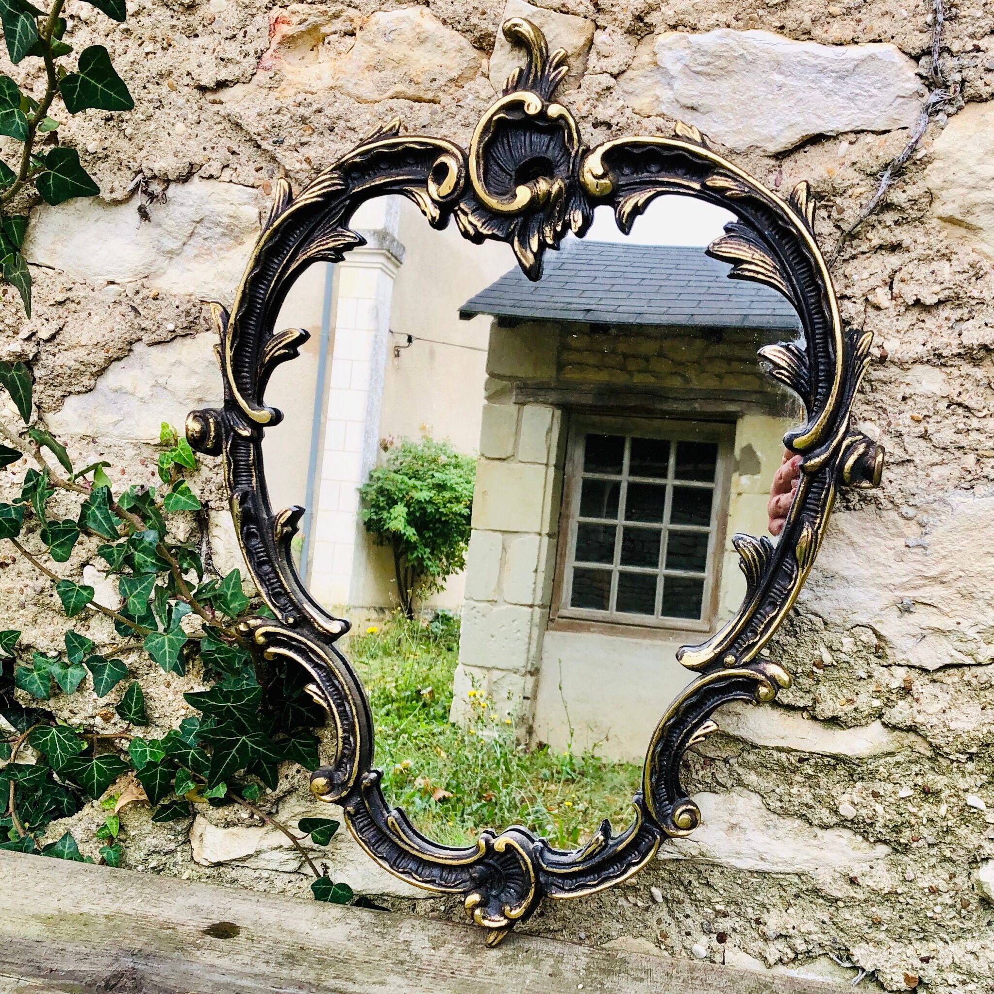 Baroque metal mirror