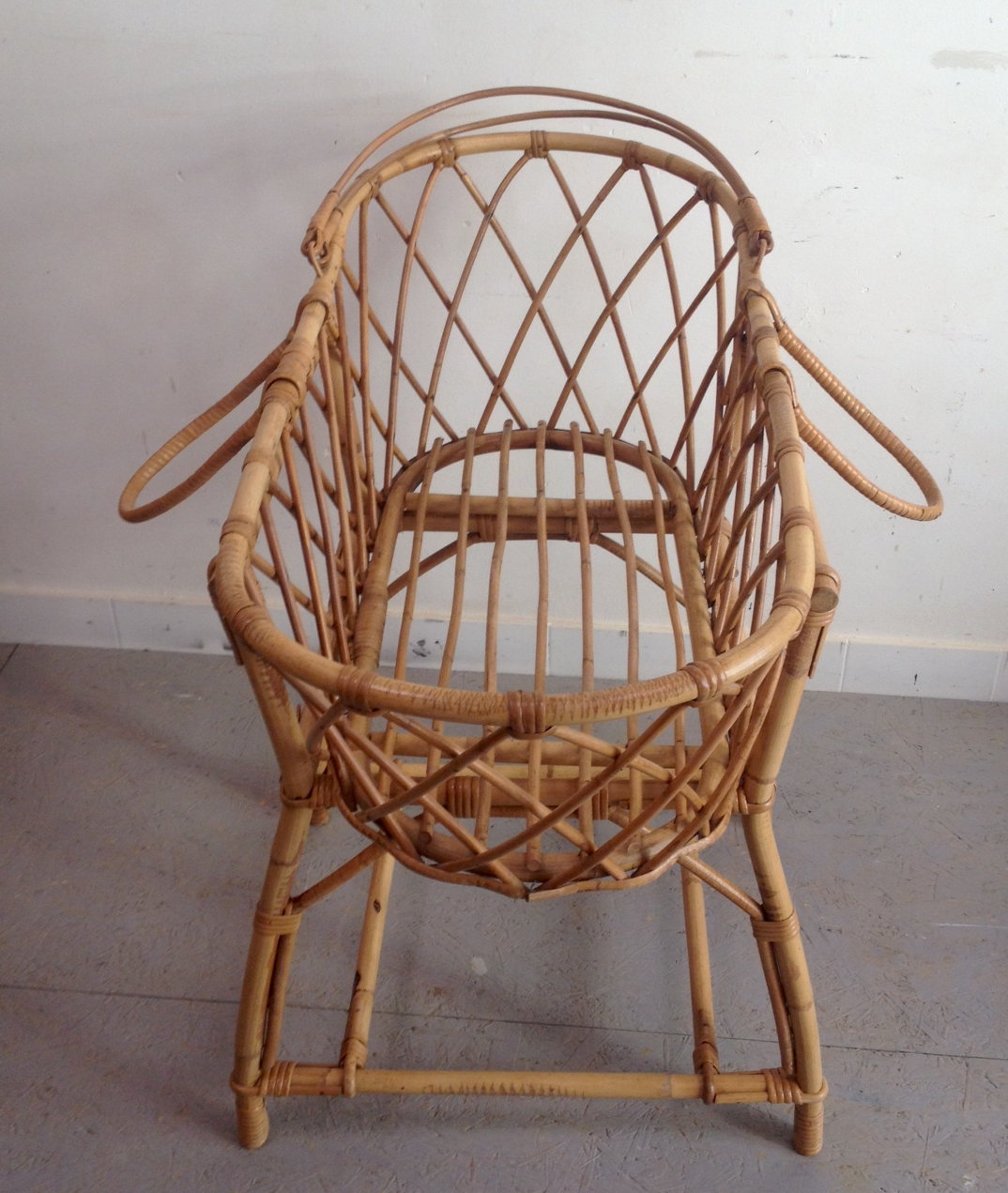 Vintage rattan cradle