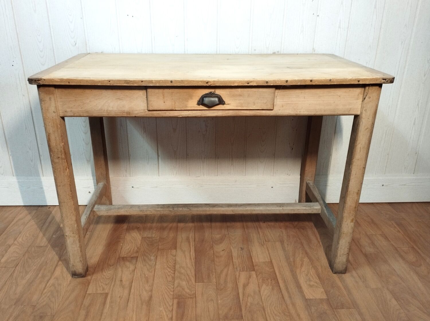 Antique farmhouse table in raw wood