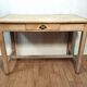Antique farmhouse table in raw wood