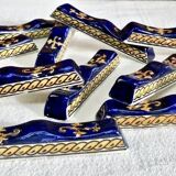 10 anciens porte couteau Gien Renaissance fond bleu