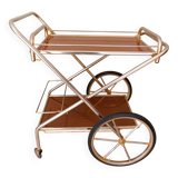 Rolling trolley in gold metal