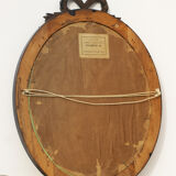 Oval mirror at ribboned knot 112x52cm