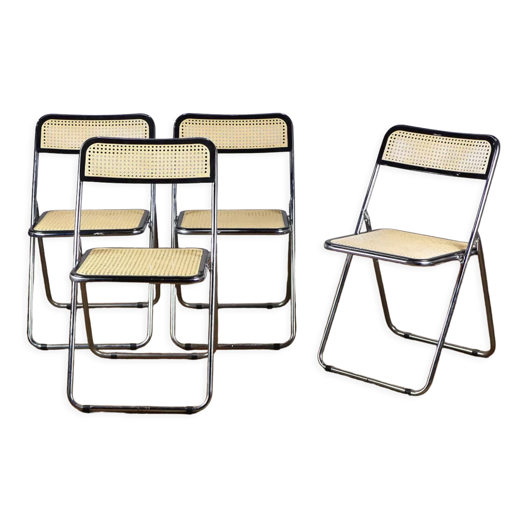 Series of 4 folding chairs in canning