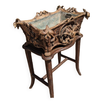 Old carved wooden planter