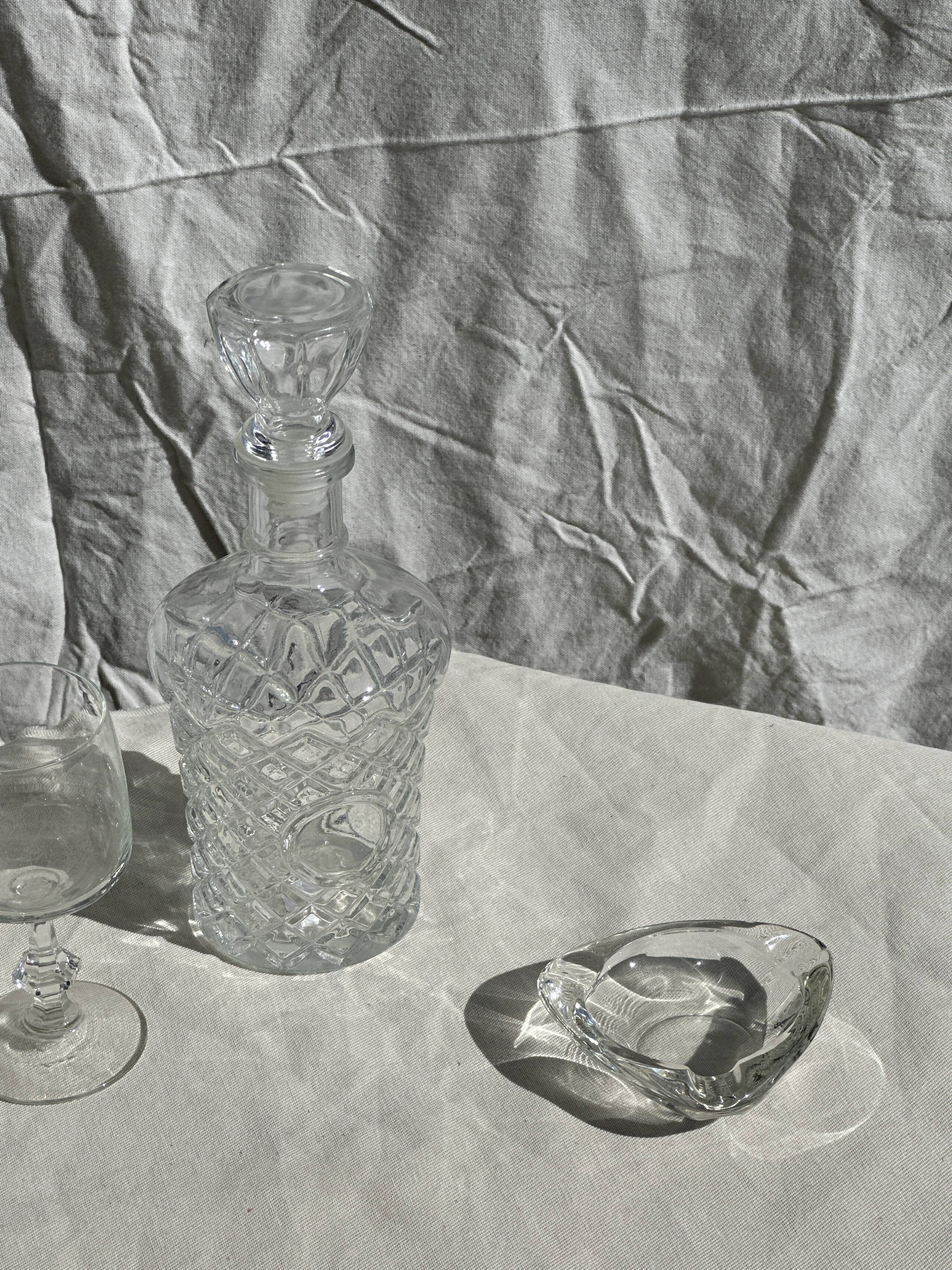 Small cylindrical glass whiskey decanter H:23