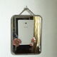 Vintage barber mirror with chain
