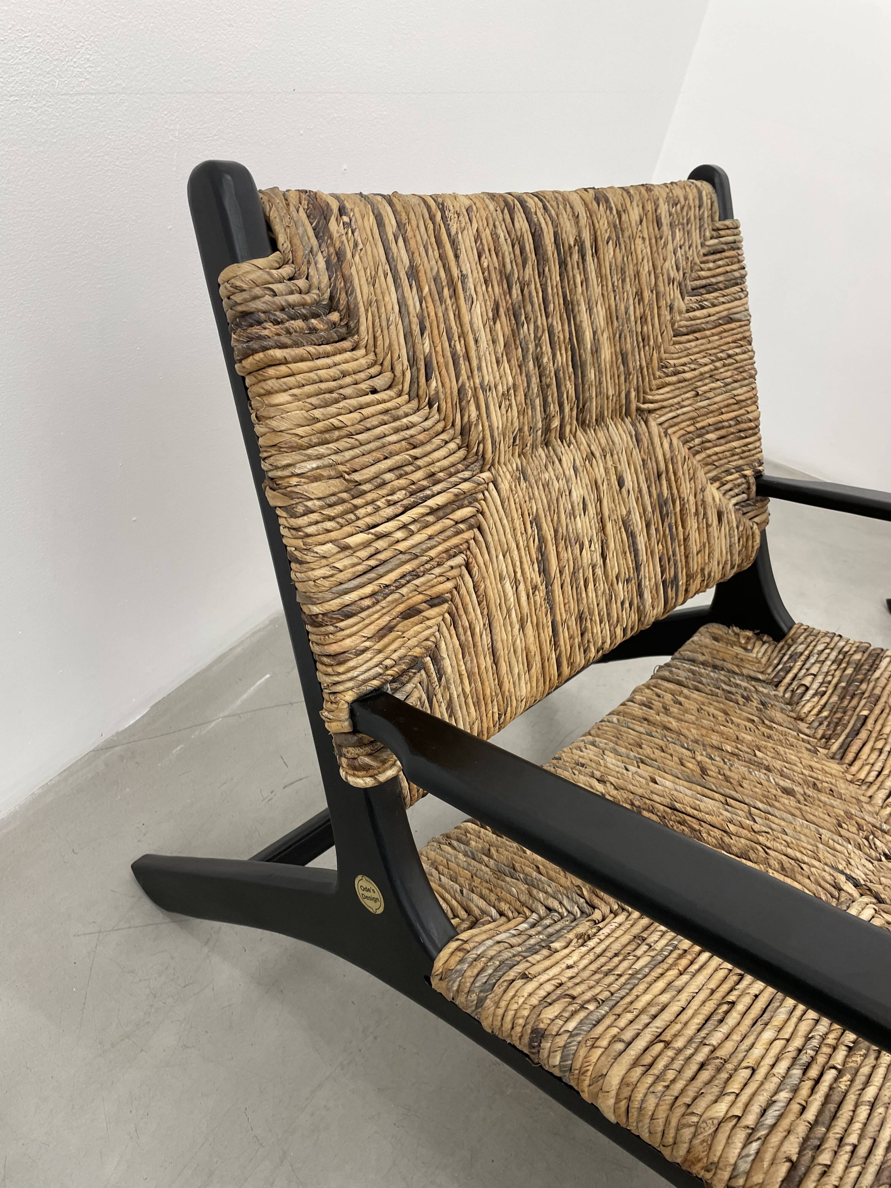 Pair of armchairs by Olivier de Schrijver in wild straw