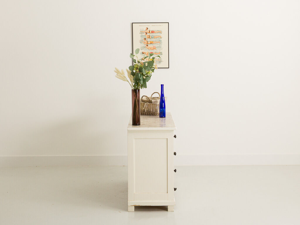 Small accent cabinet with drawers and swing doors