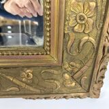 Large rectangular beveled mirror with gold stucco