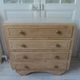 Vintage oak chest of drawers, a travertine plate laid for tray.