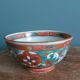 Ancient Chinese ceramic bowl from the 19th century in Bencharong style.