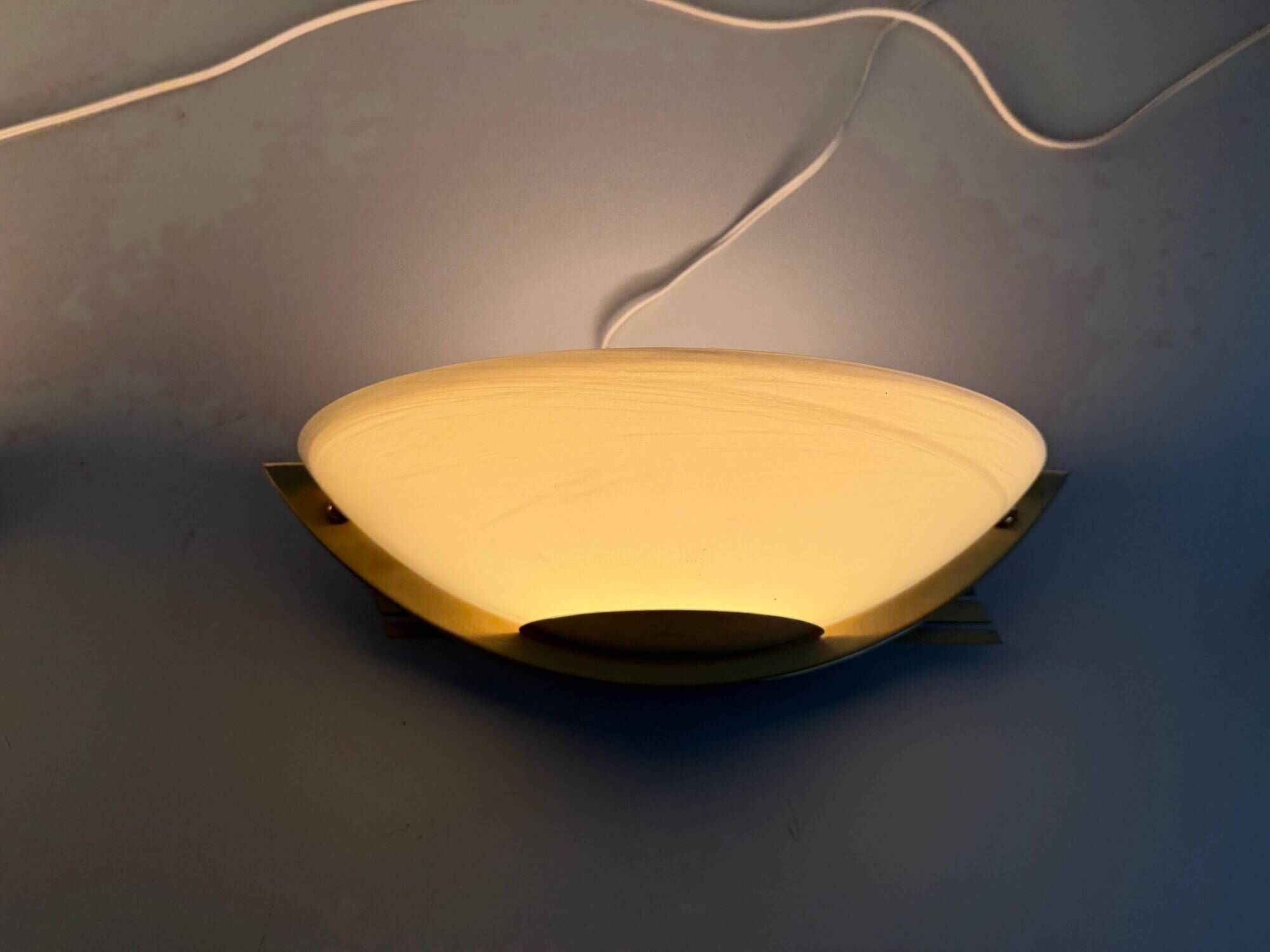 Pair of brass and glass wall lights from the Spage era, 1980, Germany.