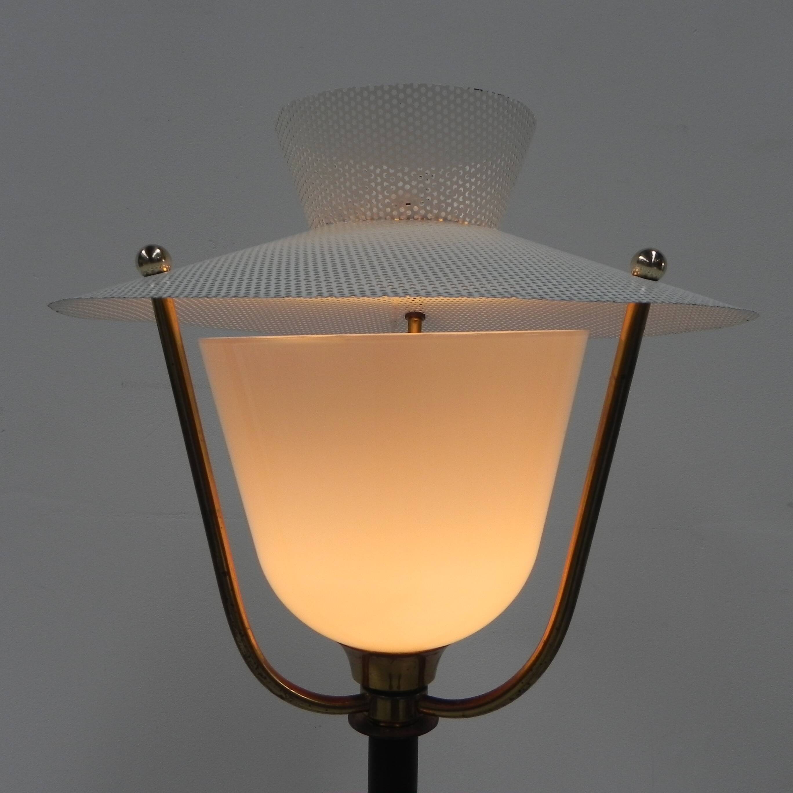 Standing vintage lamp with glass shade and perforated steel shade